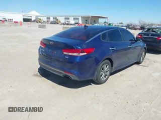 2016 Kia Optima LX Turbo with VIN 5XXGT4L13GG030586, listed as a IAAI auction lot 41824682 with 147,401 mi miles. Bid and sale history available at carsss.com. Image 4.