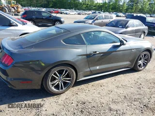 2016 Ford Mustang EcoBoost z VIN 1FA6P8TH4G5241245, wystawiony jako IAAI lot #42276819 z przebiegiem 80 190 mil mil oraz . Historia ofert i sprzedaży dostępna na DreamBid. Obrazek 13.
