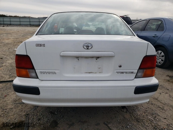 1995 Toyota Tercel DX with VIN JT2EL56D9S0074954, listed as a Copart auction lot 82666514 with 96,300 mi miles and Salvage Title. Bid and sale history available at carsss.com. Image 6.