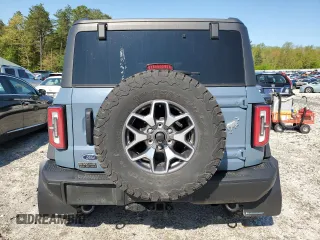 2023 Ford Bronco with VIN 1FMEE5DH2PLB00979, listed as a Copart auction lot 56652305 with 31,653 mi miles and Salvage title. Bid and sale history available at DreamBid. Image 6.