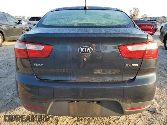 2014 Kia Rio EX with VIN KNADN4A39E6325590, listed as a Copart auction lot 71774344 with 90,785 mi miles and Salvage Title. Bid and sale history available at carsss.com. Image 6.