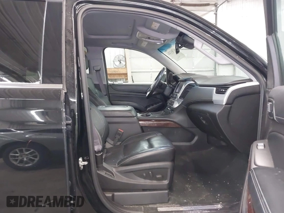 2016 GMC Yukon SLT with VIN 1GKS2BKC9GR176948, listed as a IAAI auction lot 41361221 with 125,178 mi miles. Bid and sale history available at carsss.com. Image 5.