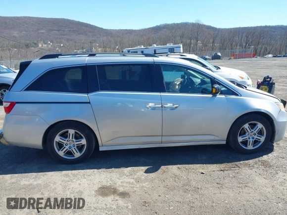 2012 Honda Odyssey Touring with VIN 5FNRL5H93CB042392, listed as a IAAI auction lot 41859533 with 169,141 mi miles. Bid and sale history available at carsss.com. Image 13.