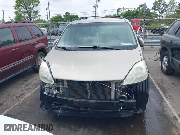2004 Toyota Sienna XLE with VIN 5TDZA22CX4S205206, listed as a IAAI auction lot 42007779 with 173,794 mi miles. Bid and sale history available at carsss.com. Image 6.