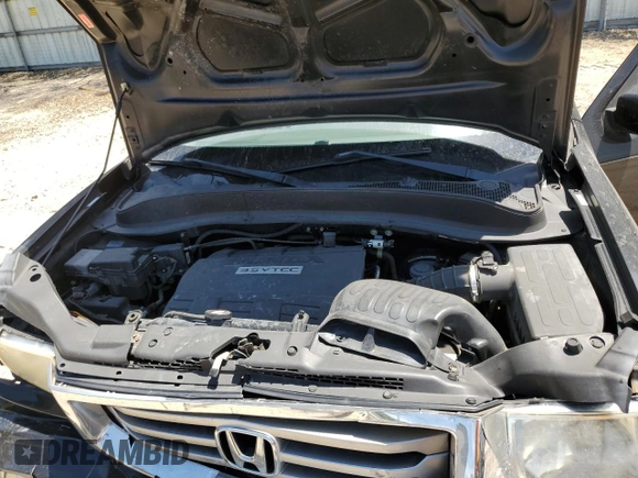 2012 Honda Ridgeline RTL z VIN 5FPYK1F51CB460223, wystawiony jako Copart lot #58218915 z przebiegiem 190 012 mil mil oraz Szkoda całkowita • Salvage title. Historia ofert i sprzedaży dostępna na DreamBid. Obrazek 11.