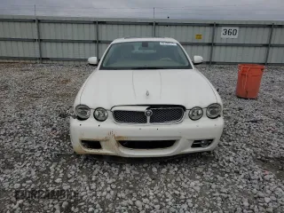 2008 Jaguar XJ with VIN SAJWA79B48SH21186, listed as a Copart auction lot 43704975 with 197,944 mi miles and Salvage Title. Bid and sale history available at carsss.com. Image 5.