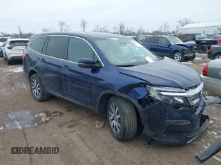 2022 Honda Pilot EX-L z VIN 5FNYF6H53NB010082, wystawiony jako IAAI lot #41605798 z przebiegiem 52 733 mil mil oraz . Historia ofert i sprzedaży dostępna na DreamBid. Obrazek 1.