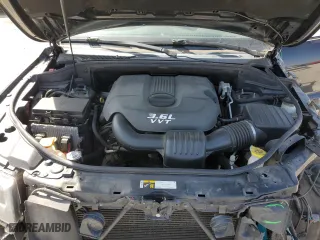2015 Jeep Grand Cherokee Laredo with VIN 1C4RJFAG0FC720473, listed as a Copart auction lot 50018345 with 104,161 mi miles and Salvage Title. Bid and sale history available at carsss.com. Image 12.