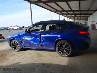 2022 BMW X4 M with VIN 5YM23EC05N9J74682, listed as a IAAI auction lot 41420906 with 46,314 mi miles. Bid and sale history available at carsss.com. Image 14.