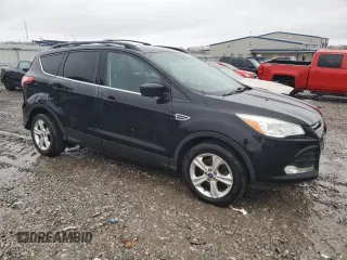 2013 Ford Escape SE z VIN 1FMCU9GX3DUA77576, wystawiony jako Copart lot #84225614 z przebiegiem 110 470 mil mil oraz Szkoda całkowita • Salvage title. Historia ofert i sprzedaży dostępna na DreamBid. Obrazek 4.