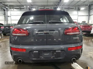 2021 MINI Clubman Cooper S with VIN WMWXJ1C05M2P49901, listed as a Copart auction lot 83023554 with 49,357 mi miles and Salvage Title. Bid and sale history available at carsss.com. Image 6.