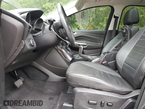2015 Ford Escape Titanium with VIN 1FMCU9J93FUA67563, listed as a Copart auction lot 61770085 with 134,201 mi miles and Salvage title. Bid and sale history available at DreamBid. Image 7.