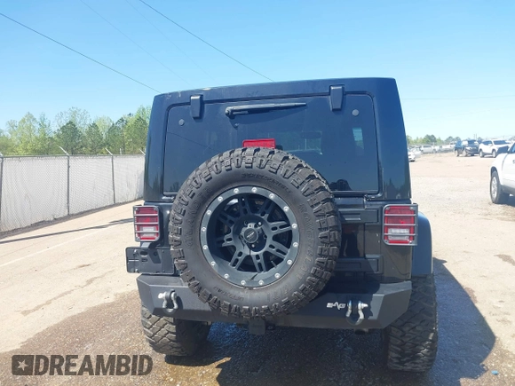 2017 Jeep Wrangler Unlimited Sahara with VIN 1C4BJWEG4HL637482, listed as a IAAI auction lot 41951349 with 76,030 mi miles. Bid and sale history available at carsss.com. Image 16.