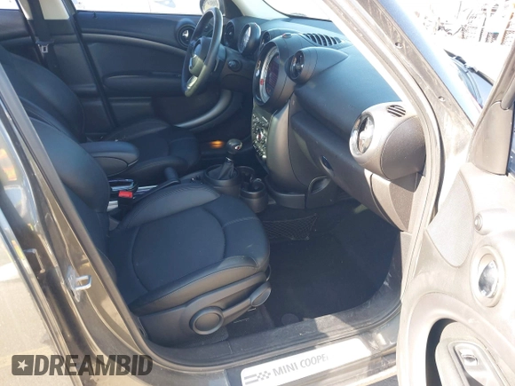 2014 MINI Countryman S z VIN WMWZC3C59EWP29686, wystawiony jako IAAI lot #42292047 z przebiegiem 93 139 mil mil oraz . Historia ofert i sprzedaży dostępna na DreamBid. Obrazek 5.