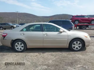 2007 Toyota Camry CE with VIN 4T1BE46K97U714878, listed as a IAAI auction lot 42002509 with 118,118 mi miles and . Bid and sale history available at DreamBid. Image 14.