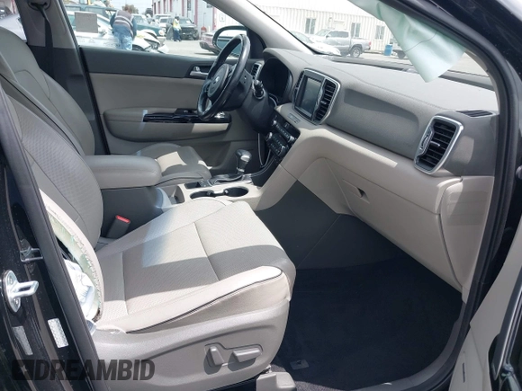 2019 Kia Sportage EX with VIN KNDPN3AC2K7602435, listed as a IAAI auction lot 42233427 with 58,730 mi miles and . Bid and sale history available at DreamBid. Image 5.