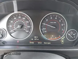 2015 BMW 4 Series 428i with VIN WBA3N3C52FK234691, listed as a IAAI auction lot 42277426 with 79,192 mi miles and . Bid and sale history available at DreamBid. Image 7.