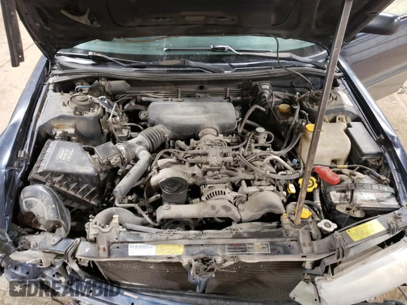 1998 Subaru Legacy Outback with VIN 4S3BG6850W7601142, listed as a Copart auction lot 57319505 with 227,489 mi miles and Salvage title. Bid and sale history available at DreamBid. Image 12.