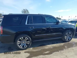 2019 GMC Yukon Denali with VIN 1GKS2CKJ4KR191886, listed as a IAAI auction lot 41198227 with 74,325 mi miles. Bid and sale history available at carsss.com. Image 13.