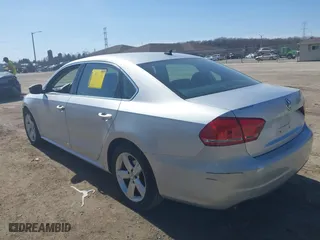 2013 Volkswagen Passat SE w/Sunroof & Nav with VIN 1VWBH7A33DC145554, listed as a IAAI auction lot 41808150 with 142,051 mi miles. Bid and sale history available at carsss.com. Image 3.