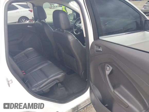 2016 Ford Escape Titanium z VIN 1FMCU9J90GUC76504, wystawiony jako IAAI lot #42552851 z przebiegiem 89 570 mil mil oraz . Historia ofert i sprzedaży dostępna na DreamBid. Obrazek 8.