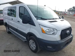 2021 Ford Transit Cargo with VIN 1FTBR1Y85MKA69355, listed as a IAAI auction lot 42544780 with 33,288 mi miles and . Bid and sale history available at DreamBid. Image 1.