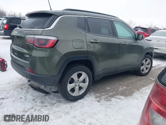 2018 Jeep Compass Altitude with VIN 3C4NJDBB1JT479462, listed as a IAAI auction lot 41276119 with 58,895 mi miles and . Bid and sale history available at carsss.com. Image 4.