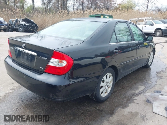 2004 Toyota Camry LE with VIN 4T1BF30K34U080477, listed as a IAAI auction lot 41956998 with 135,441 mi miles. Bid and sale history available at carsss.com. Image 4.