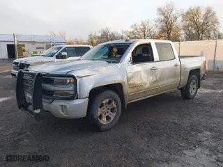 2016 Chevrolet Silverado 1500 LT with VIN 3GCUKREC7GG314592, listed as a IAAI auction lot 40813513 with 294,048 mi miles. Bid and sale history available at carsss.com. Image 2.