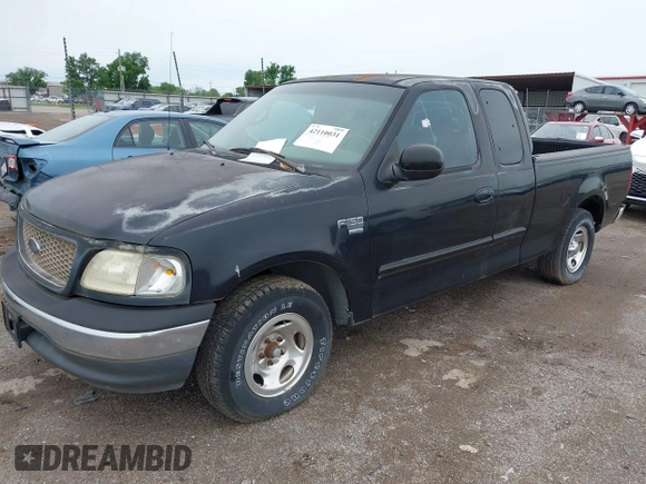 2000 Ford F-150 XL with VIN 1FTRX17L6YKA30614, listed as a IAAI auction lot 42110031 with Not provided miles and . Bid and sale history available at DreamBid. Image 2.