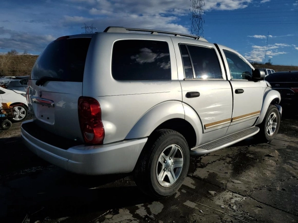 2005 Dodge Durango Limited with VIN 1D4HD58N95F533279, listed as a Copart auction lot 46454565 with 130,639 mi miles and Salvage title. Bid and sale history available at DreamBid. Image 3.