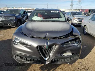 2019 Alfa Romeo Stelvio Ti z VIN ZASPAKBN0K7C56432, wystawiony jako Copart lot #85646664 z przebiegiem Nie podano mil oraz Szkoda całkowita • Salvage title. Historia ofert i sprzedaży dostępna na DreamBid. Obrazek 5.