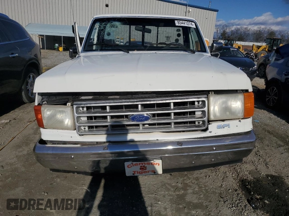 1987 Ford F-150 with VIN 1FTCF15Y7HNA56371, listed as a Copart auction lot 85441274 with 76,200 mi miles and Salvage Title. Bid and sale history available at carsss.com. Image 5.