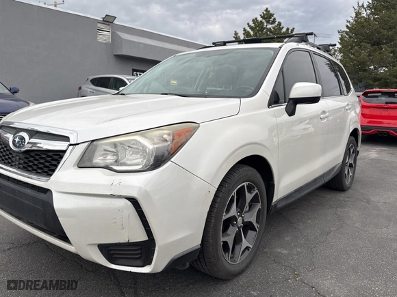 2014 Subaru Forester 2.0XT Premium with VIN JF2SJGDC1EH477436, listed as a Copart auction lot 54798465 with 124,807 mi miles and Clean Title. Bid and sale history available at carsss.com. Image 2.