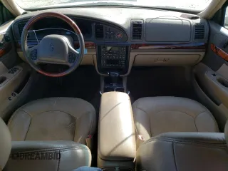 2002 Lincoln Continental with VIN 1LNHM97V62Y699096, listed as a Copart auction lot 77789474 with 106,198 mi miles and Clean Title. Bid and sale history available at carsss.com. Image 8.