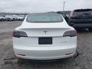 2022 Tesla Model 3 Long Range with VIN 5YJ3E1EB0NF129945, listed as a IAAI auction lot 41965531 with 59,162 mi miles and . Bid and sale history available at DreamBid. Image 16.