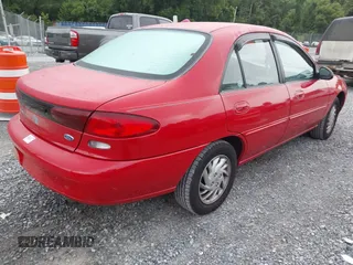 1997 Ford Escort LX z VIN 1FALP13P6VW375778, wystawiony jako IAAI lot #42787699 z przebiegiem 86 715 mil mil oraz . Historia ofert i sprzedaży dostępna na DreamBid. Obrazek 4.