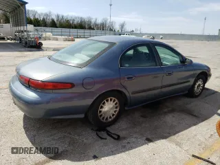 1999 Mercury Sable GS with VIN 1MEFM50U1XA653292, listed as a Copart auction lot 51307905 with 210,945 mi miles and Salvage title. Bid and sale history available at DreamBid. Image 3.
