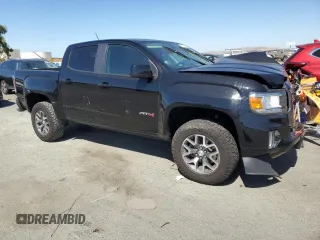 2021 GMC Canyon 4WD AT4 w/Cloth with VIN 1GTG6FEN4M1268263, listed as a Copart auction lot 72393764 with 42,249 mi miles and Salvage Title. Bid and sale history available at carsss.com. Image 4.