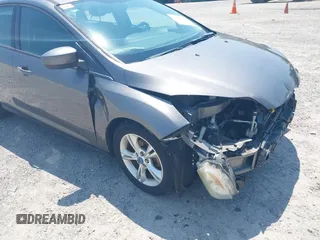 2012 Ford Focus SE z VIN 1FAHP3K28CL229646, wystawiony jako IAAI lot #42491915 z przebiegiem 174 105 mil mil oraz . Historia ofert i sprzedaży dostępna na DreamBid. Obrazek 14.