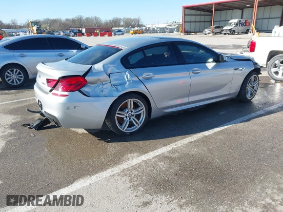 2015 BMW 6 Series 640i xDrive with VIN WBA6B8C52FD453433, listed as a IAAI auction lot 41805317 with 138,685 mi miles and . Bid and sale history available at carsss.com. Image 4.