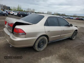 2001 Honda Accord LX z VIN 1HGCG56471A806768, wystawiony jako Copart lot #57066765 z przebiegiem 166 743 mil mil oraz Czysty tytuł • Clean title. Historia ofert i sprzedaży dostępna na DreamBid. Obrazek 3.
