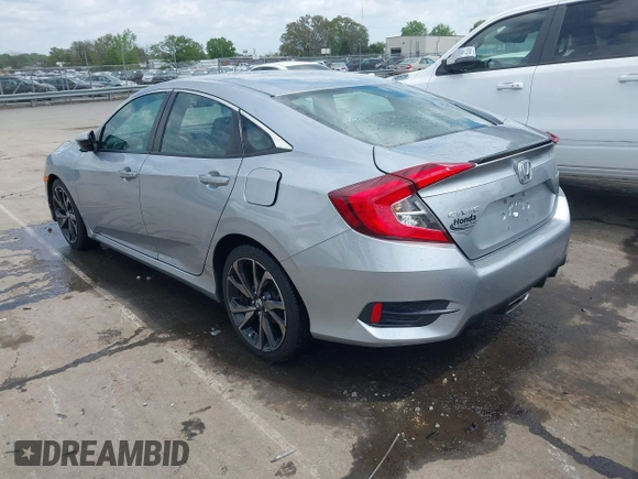 2021 Honda Civic Sport with VIN 2HGFC2F88MH530214, listed as a IAAI auction lot 41968361 with 60,869 mi miles and . Bid and sale history available at DreamBid. Image 3.