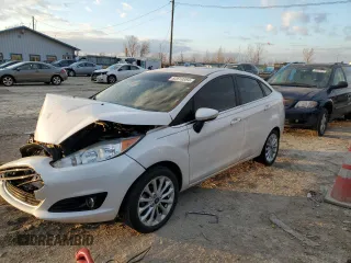 2017 Ford Fiesta Titanium with VIN 3FADP4CJ9HM136313, listed as a Copart auction lot 82610884 with Not Provided miles and Salvage Title. Bid and sale history available at carsss.com. Image 1.
