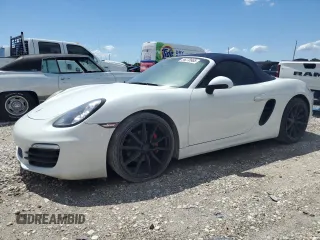 2015 Porsche Boxster with VIN WP0CA2A86FS120201, listed as a Copart auction lot 56278965 with 87,212 mi miles and Salvage title. Bid and sale history available at DreamBid. Image 1.