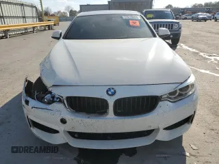 2015 BMW 4 Series 428i xDrive with VIN WBA3N5C5XFK197692, listed as a Copart auction lot 77219684 with 96,148 mi miles and Salvage title. Bid and sale history available at DreamBid. Image 5.