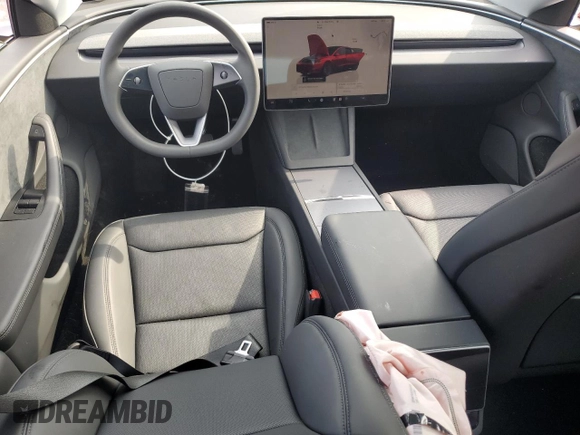 2025 Tesla Model 3 Long Range with VIN 5YJ3E1EB5SF895861, listed as a Copart auction lot 60513665 with 5,637 mi miles and Salvage title. Bid and sale history available at DreamBid. Image 8.