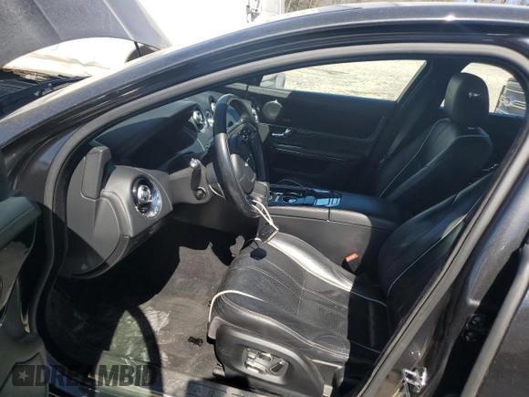 2013 Jaguar XJ Portfolio with VIN SAJWJ2GDXD8V45921, listed as a Copart auction lot 49289825 with 115,152 mi miles and Salvage title. Bid and sale history available at DreamBid. Image 7.