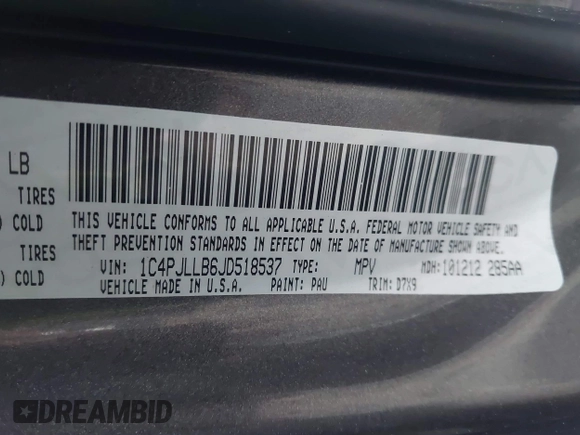 2018 Jeep Cherokee Latitude Plus with VIN 1C4PJLLB6JD518537, listed as a IAAI auction lot 41458748 with 82,093 mi miles. Bid and sale history available at carsss.com. Image 9.