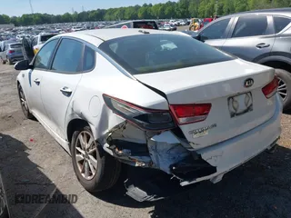 2017 Kia Optima LX with VIN 5XXGT4L32HG156781, listed as a IAAI auction lot 42044826 with 295,162 mi miles and . Bid and sale history available at carsss.com. Image 3.